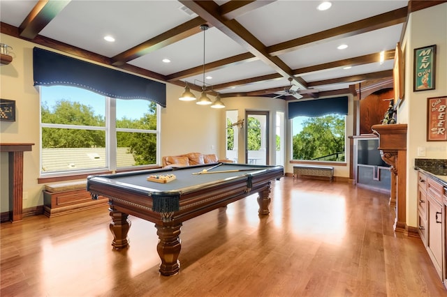 recreation room with light hardwood / wood-style flooring, pool table, beam ceiling, coffered ceiling, and ceiling fan