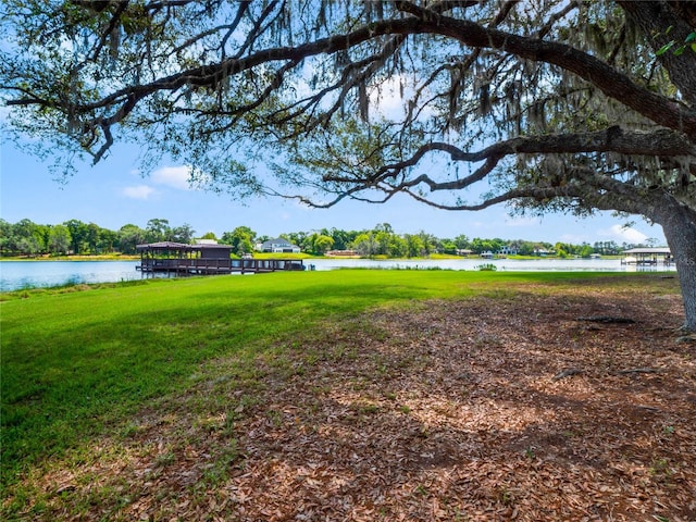 view of yard with a water view