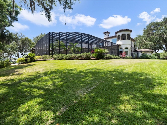 view of yard with a lanai