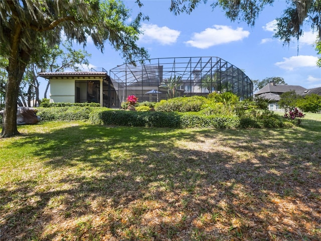 view of yard featuring a lanai