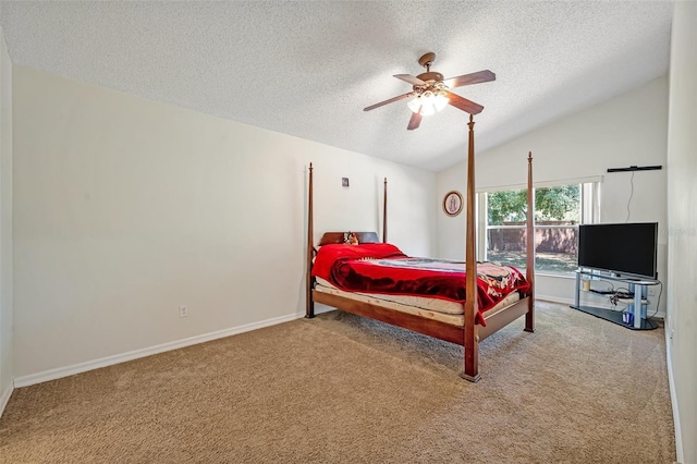 carpeted bedroom featuring a textured ceiling, lofted ceiling, and ceiling fan