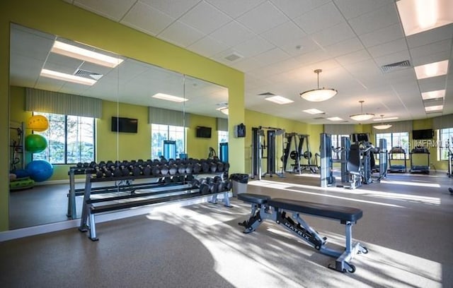 workout area featuring a drop ceiling