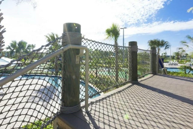 view of gate with a water view