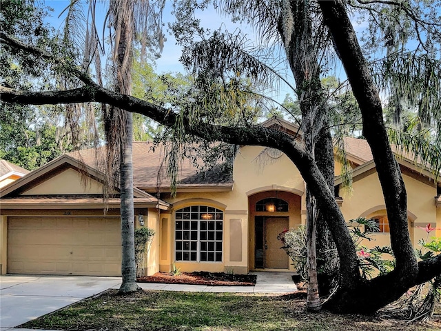 view of front of property with a garage