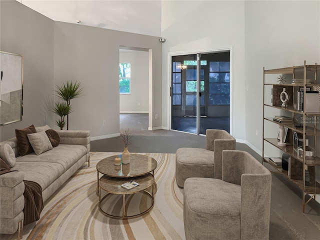 living room with a high ceiling