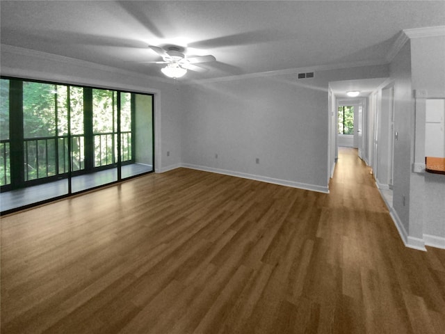 spare room with ornamental molding, ceiling fan, and hardwood / wood-style floors