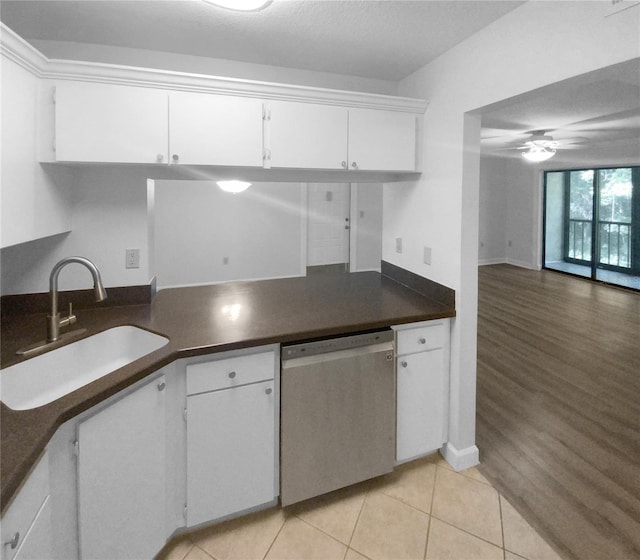 kitchen with light hardwood / wood-style flooring, ceiling fan, white cabinetry, and stainless steel dishwasher