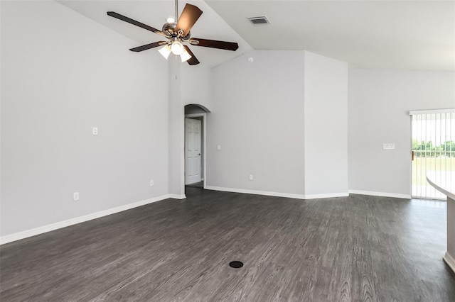 unfurnished room with high vaulted ceiling, dark wood-type flooring, and ceiling fan