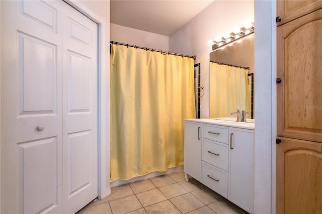 bathroom with vanity and tile patterned floors