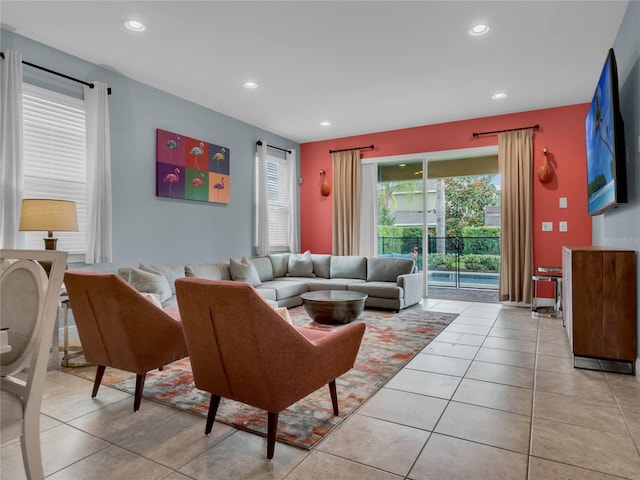 living room featuring light tile floors