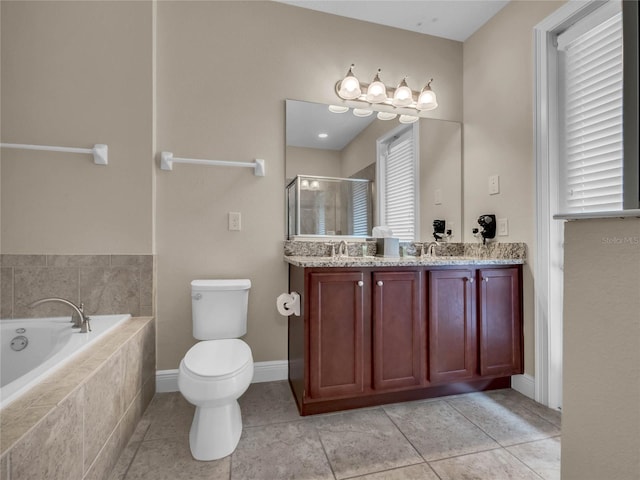 full bathroom with plenty of natural light, toilet, tile floors, and vanity with extensive cabinet space