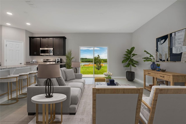 living room with light tile patterned floors