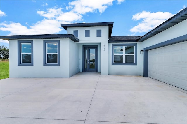 view of front of home featuring a garage