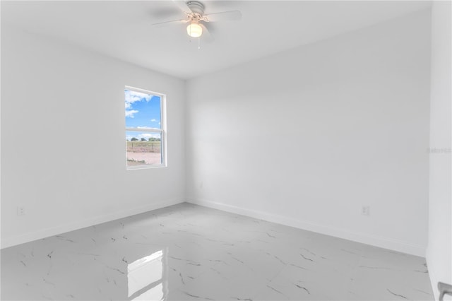 unfurnished room with ceiling fan