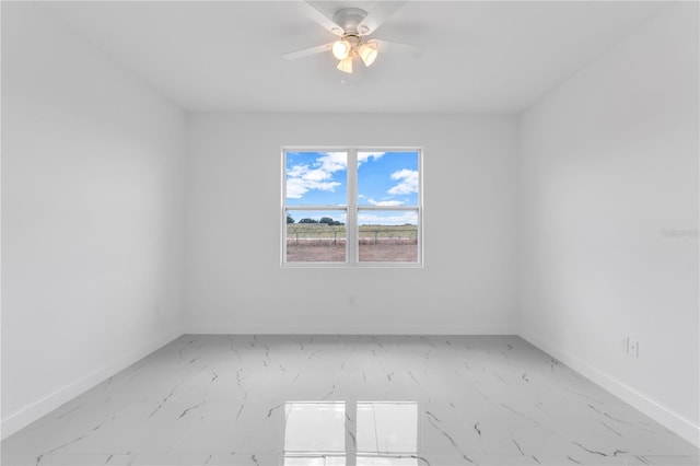 unfurnished room with ceiling fan