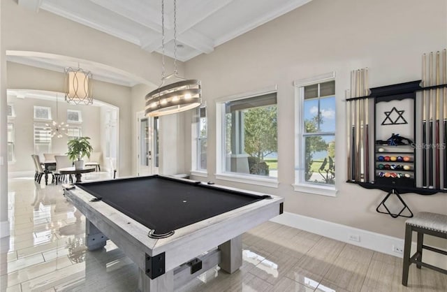 rec room with ornamental molding, pool table, beam ceiling, and tile flooring