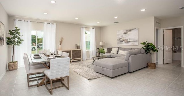 living room featuring light tile patterned flooring