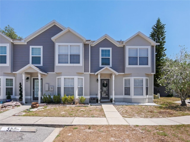 view of front of home featuring central air condition unit