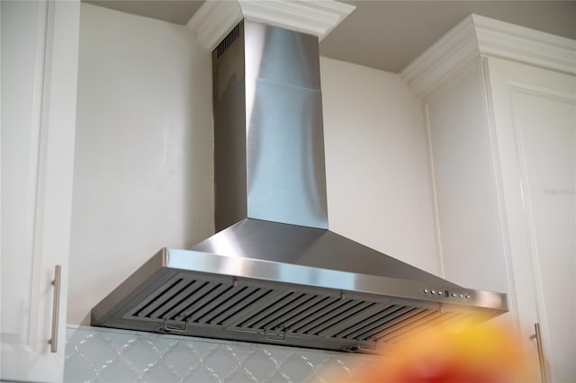 interior details with wall chimney exhaust hood