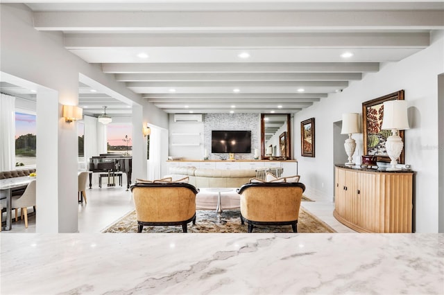 living room featuring beam ceiling