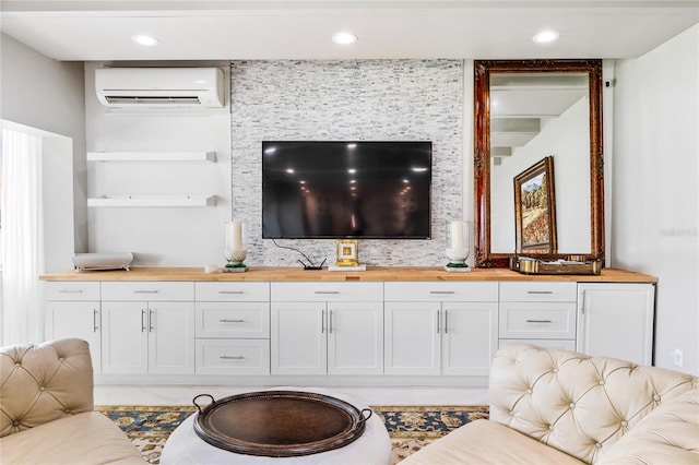 tiled living room with a wall unit AC