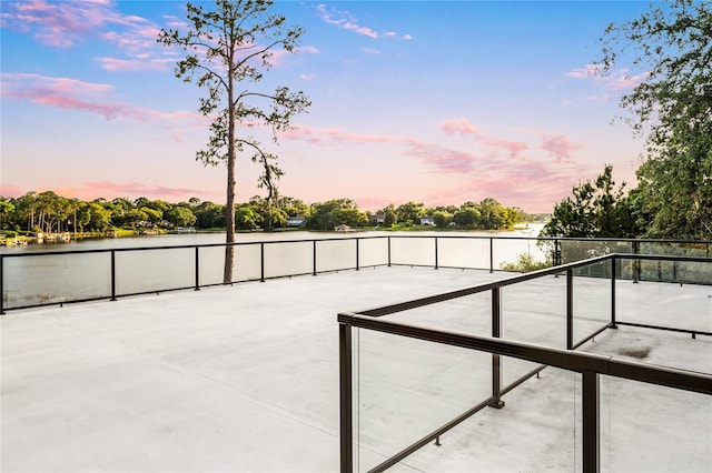 patio terrace at dusk with a balcony