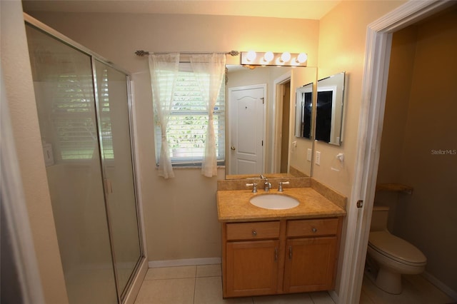 bathroom featuring walk in shower, vanity, toilet, and tile floors