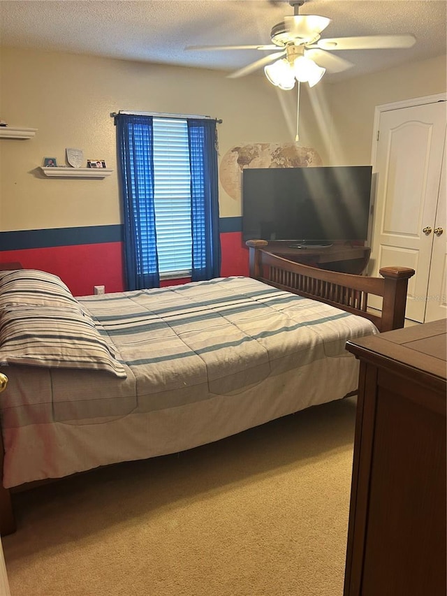 1201 Thornbury Ct, Winter Garden, FL 34787 - bedroom featuring a ceiling fan and a textured ceiling