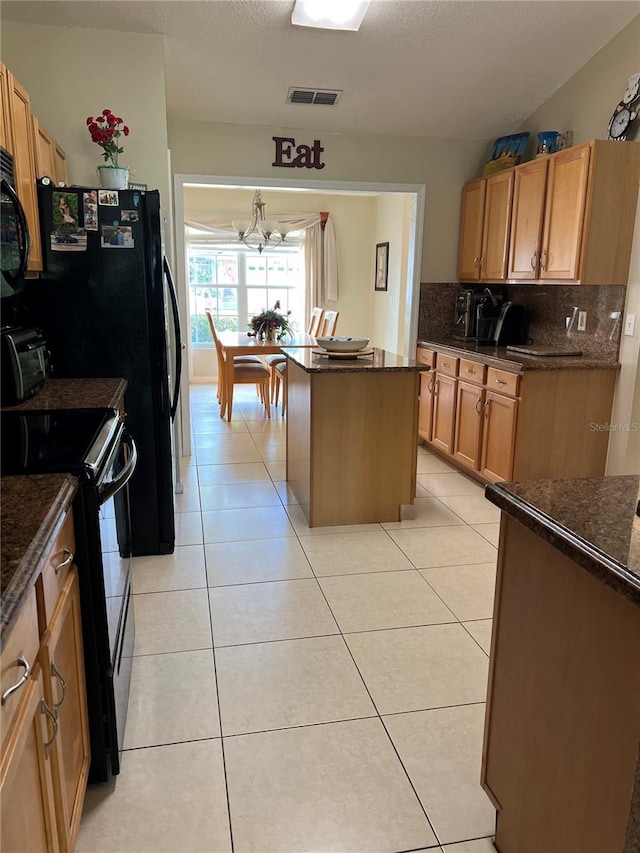 1201 Thornbury Ct, Winter Garden, FL 34787 - kitchen featuring visible vents, a center island, tasteful backsplash, black appliances, and a notable chandelier