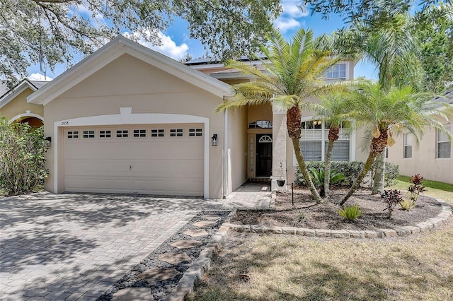 2938 Daybreak Dr, Orlando, FL 32825 - view of front facade featuring a garage