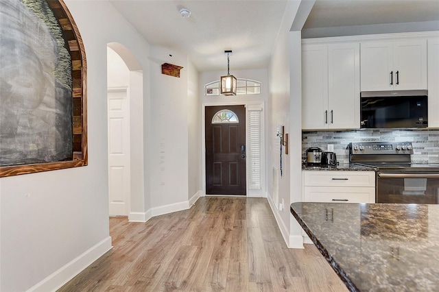 foyer featuring light wood-type flooring