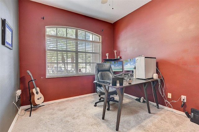 office area with ceiling fan and carpet floors