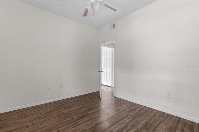 unfurnished room featuring ceiling fan and dark hardwood / wood-style floors