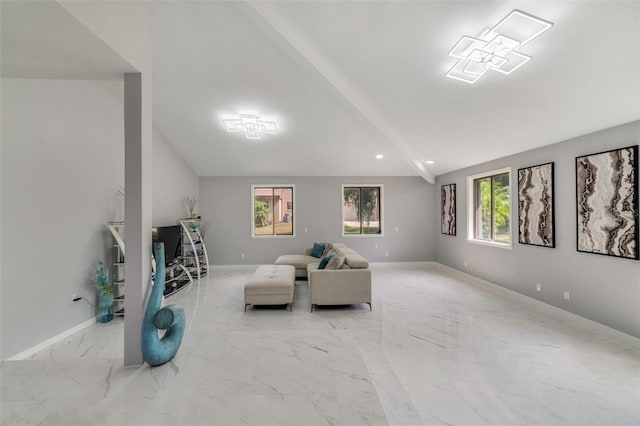 living area with lofted ceiling with beams