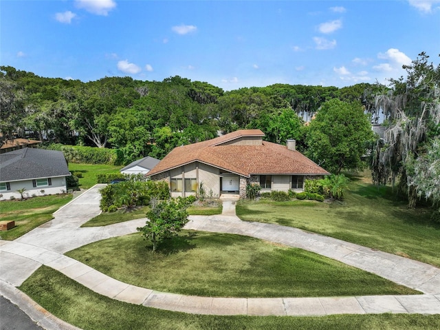 view of front of property with a front lawn