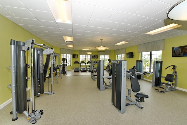 gym featuring a paneled ceiling