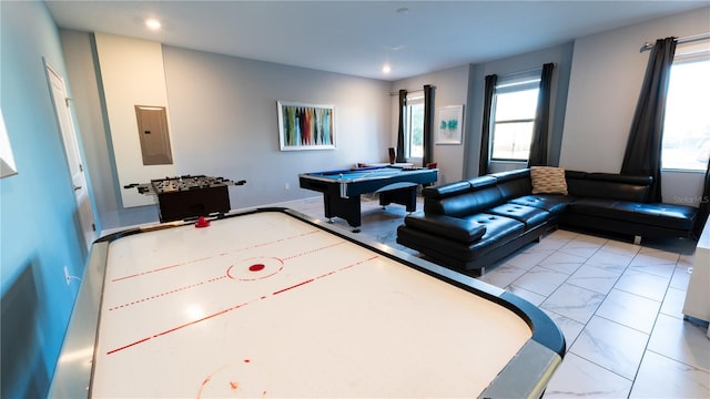 rec room with pool table and light tile floors