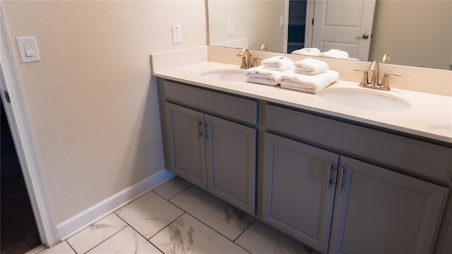 bathroom with tile floors and dual vanity