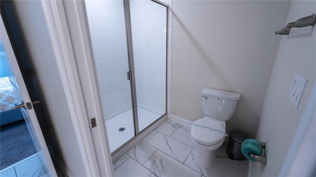 bathroom with a shower with door, tile flooring, and toilet