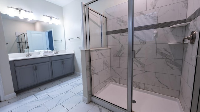 bathroom with a shower with door, tile flooring, and double vanity