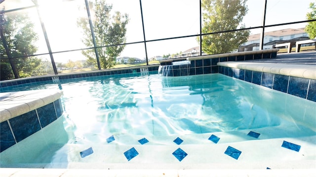 view of swimming pool with glass enclosure