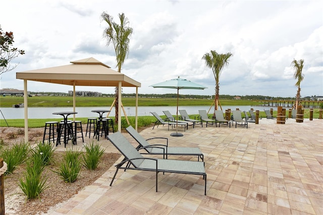 view of patio / terrace with a water view