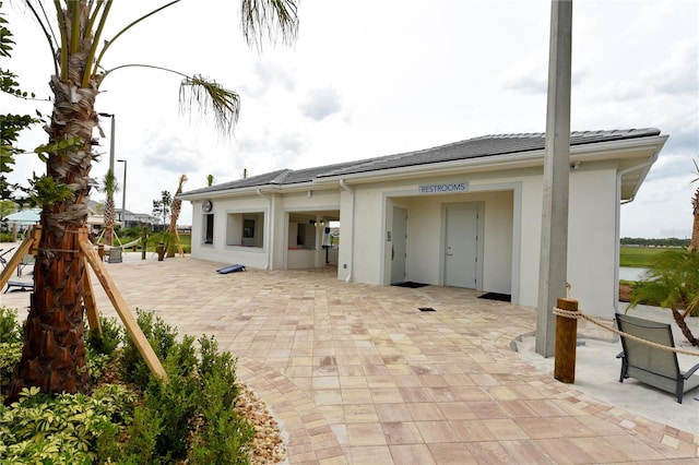 rear view of property with a patio