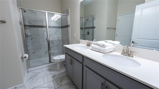 bathroom with dual sinks, a shower with shower door, tile floors, toilet, and large vanity