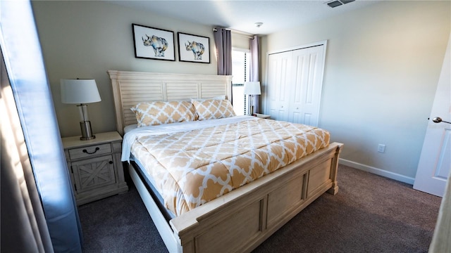 carpeted bedroom featuring a closet