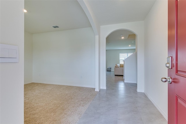 view of tiled foyer entrance