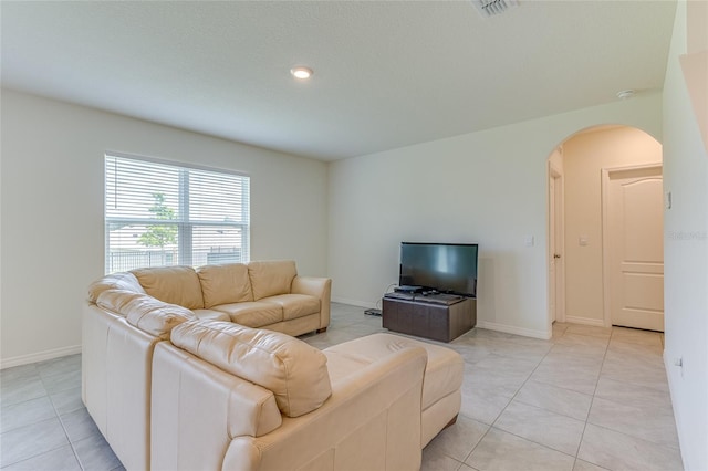 living room with light tile flooring