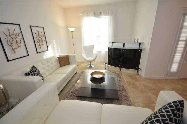 living room with tile flooring