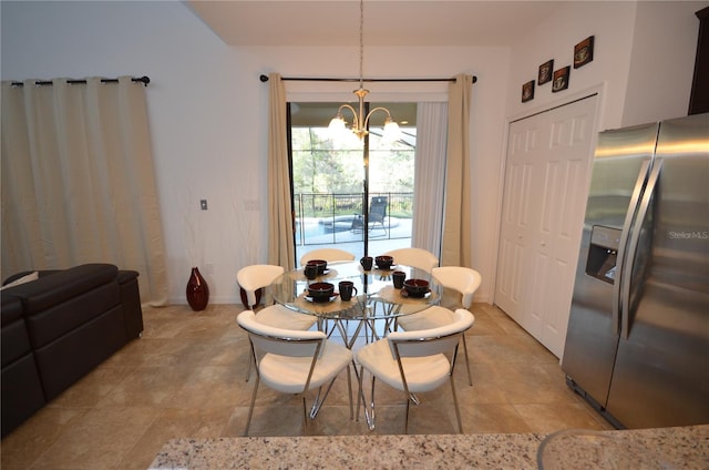 dining room featuring an inviting chandelier and light tile floors