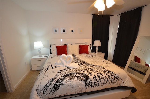 carpeted bedroom with ceiling fan